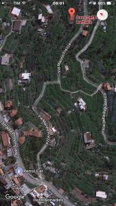 a map of a city with a road and buildings at La Casa Del Nonno Raffaele- Country house in Ravello