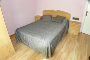 Postel nebo postele na pokoji v ubytování Hostal Restaurant Jose Luis