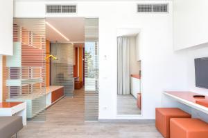 TV a/nebo společenská místnost v ubytování Hotel Tenda Rossa