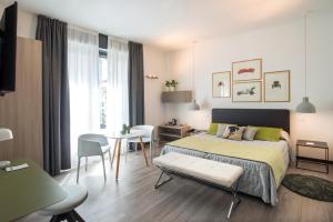 Postel nebo postele na pokoji v ubytování Hotel Bernina