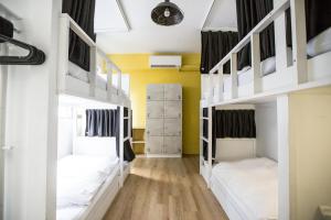 Letto o letti in una camera di We Come Hostel