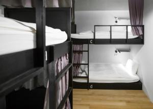 Letto o letti in una camera di We Come Hostel