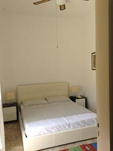 Postel nebo postele na pokoji v ubytování Casa vacanza Lipari