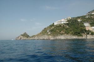 a view of an island from the water at Hotel Belvedere in Conca dei Marini