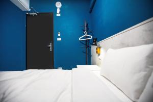 Letto o letti in una camera di We Come Hostel