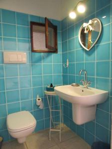 Koupelna v ubytování Cavalli di S'Arcaite