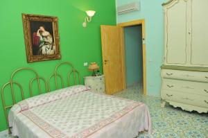 Postel nebo postele na pokoji v ubytování Albergo Roses