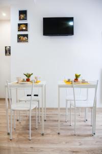 TV a/nebo společenská místnost v ubytování Darrè