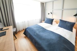 Fosshotel Reykholt客房内的一张或多张床位