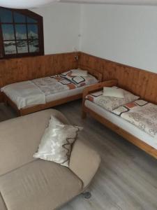 Posteľ alebo postele v izbe v ubytovaní Penzion OK
