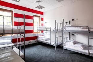 Posteľ alebo postele v izbe v ubytovaní Inbed Hostel