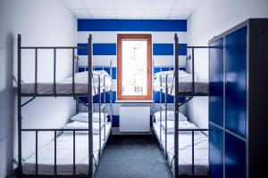Posteľ alebo postele v izbe v ubytovaní Inbed Hostel
