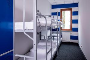 Posteľ alebo postele v izbe v ubytovaní Inbed Hostel