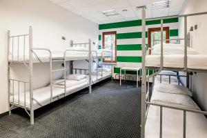 Posteľ alebo postele v izbe v ubytovaní Inbed Hostel