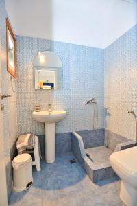 Koupelna v ubytování Cyclades Beach