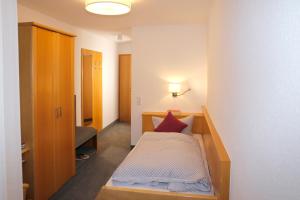 Letto o letti in una camera di Pension Arcade
