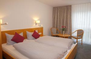 Letto o letti in una camera di Pension Arcade