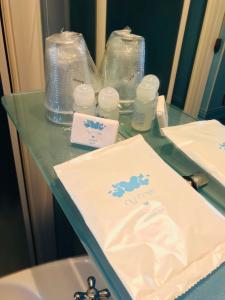 a counter with a sink with a cake on it at B&B Villa Primavera in Pisa