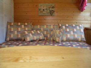 Postel nebo postele na pokoji v ubytování Ferienhaus Erzgebirge "An der Trebe" mit Kamin und Sauna