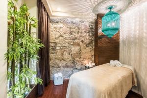 Postel nebo postele na pokoji v ubytování Edelmira Hotel Boutique