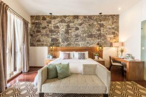 Postel nebo postele na pokoji v ubytování Edelmira Hotel Boutique