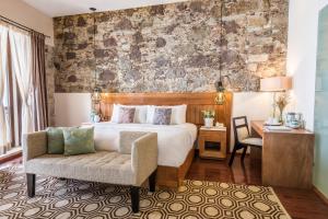 Postel nebo postele na pokoji v ubytování Edelmira Hotel Boutique