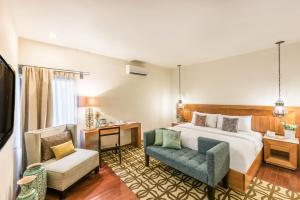 Postel nebo postele na pokoji v ubytování Edelmira Hotel Boutique
