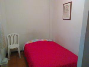 Postel nebo postele na pokoji v ubytování Habita Estudios Laureles