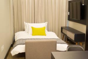 I am Design Hotel Campinas by Hotelaria Brasil客房内的一张或多张床位