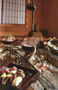 a kitchen with many different types of food at Takimi Onsen Inn that only accepts one group per day in Nagiso