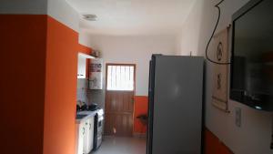 Kuchyň nebo kuchyňský kout v ubytování Cabañas Casa de colores + 7 fotografií