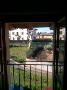 a view from a window of a yard at Montorfano Haus in Rovato