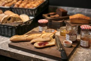 a loaf of bread on a cutting board at Campanile Shanghai Natural History Museum Hotel in Shanghai