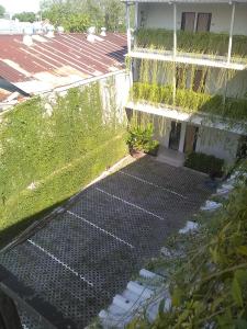 an overhead view of a tennis court on the side of a building at Hotel Sampurna Cirebon in Cirebon