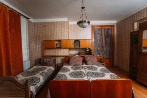 Postel nebo postele na pokoji v ubytování Bolnisi Prime House