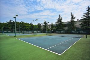 Tenis a/nebo squash v ubytování Xijiao State Guest Hotel nebo okolí