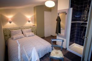 Una cama o camas en una habitación de Gîte entre Bordeaux et Saint-Emilion