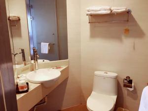 Ein Badezimmer in der Unterkunft Goldmet Inn Taiyuan Shanxi University