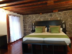 Postelja oz. postelje v sobi nastanitve Hotel Emblemático Arucas