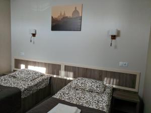 Posteľ alebo postele v izbe v ubytovaní Art Hotel Palma