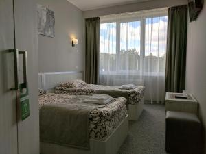 Posteľ alebo postele v izbe v ubytovaní Art Hotel Palma