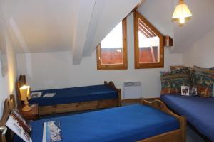 Postel nebo postele na pokoji v ubytování Peclet Appartements VTI