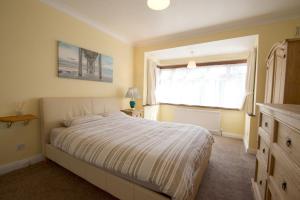 Cama o camas de una habitación en Barnet 3 Bedroom House