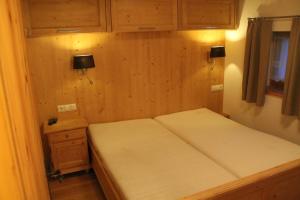 Posteľ alebo postele v izbe v ubytovaní Chalet Alte Mühle