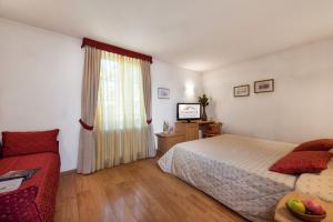 Voodi või voodid majutusasutuse Romantic Charming Hotel Rancolin toas
