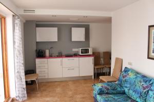 Kuchyň nebo kuchyňský kout v ubytování Apartamento de Silvia + 20 fotografií