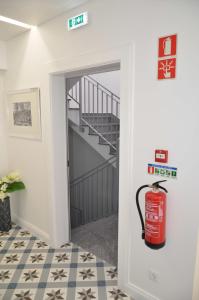 a room with a fire hydrant in the doorway at Edifício Charles 203 in Funchal