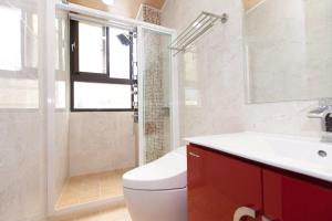 Koupelna v ubytování Rain Sun Homestay + 12 fotografií