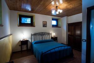 Ένα ή περισσότερα κρεβάτια σε δωμάτιο στο Country House Il Tiglio