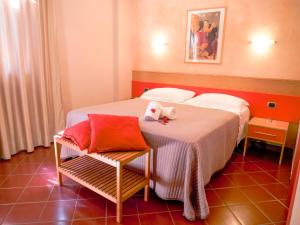 Postel nebo postele na pokoji v ubytování Hotel Diana